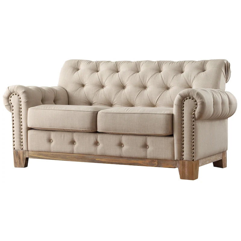 Gecapitonneerde Chesterfield loveseat met gerolde armleuningen en nagelkopaccenten
