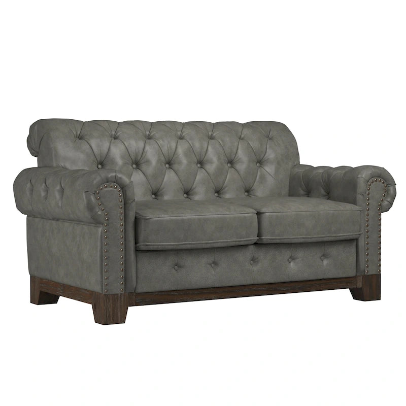 Gecapitonneerde Chesterfield loveseat met gerolde armleuningen en nagelkopaccenten