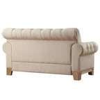 Gecapitonneerde Chesterfield loveseat met gerolde armleuningen en nagelkopaccenten