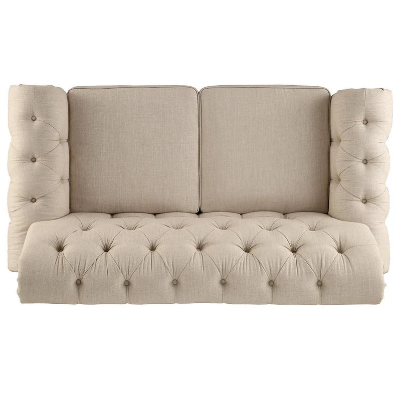 Gecapitonneerde Chesterfield loveseat met gerolde armleuningen en nagelkopaccenten
