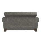 Gecapitonneerde Chesterfield loveseat met gerolde armleuningen en nagelkopaccenten