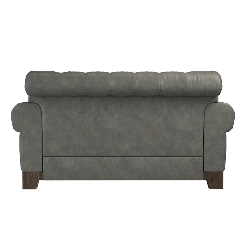 Gecapitonneerde Chesterfield loveseat met gerolde armleuningen en nagelkopaccenten