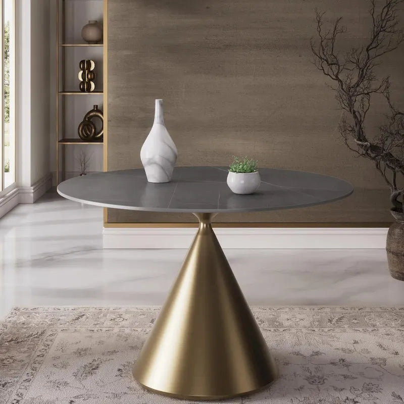 Moderne ronde eettafel met gouden metalen onderstel