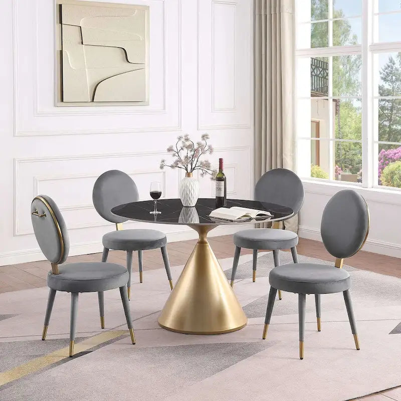 Moderne ronde eettafel met gouden metalen onderstel