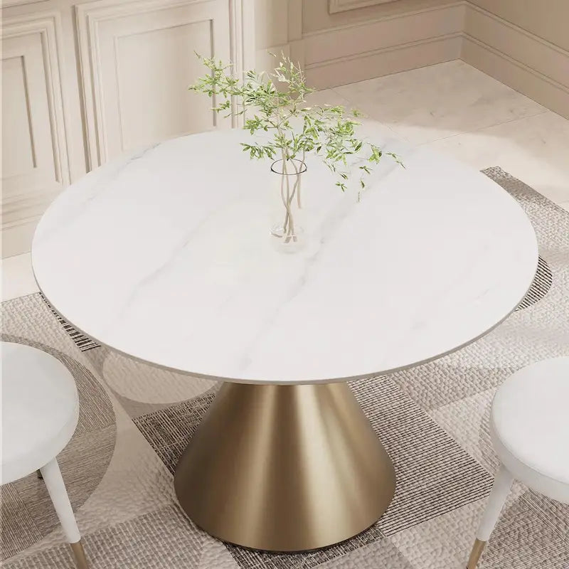 Moderne ronde eettafel met gouden metalen onderstel